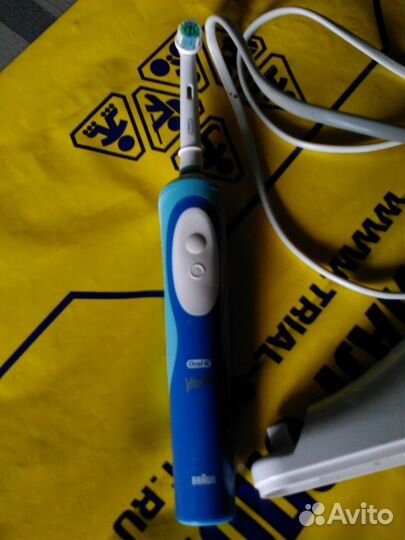 Зубная электрощетка