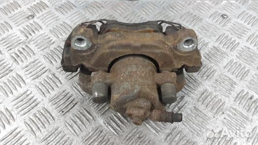 Суппорт тормозной передний левый volkswagen jetta