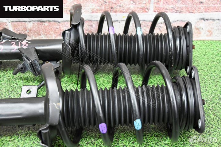 Стойки передние Mazda Axela BL3FW L5VE