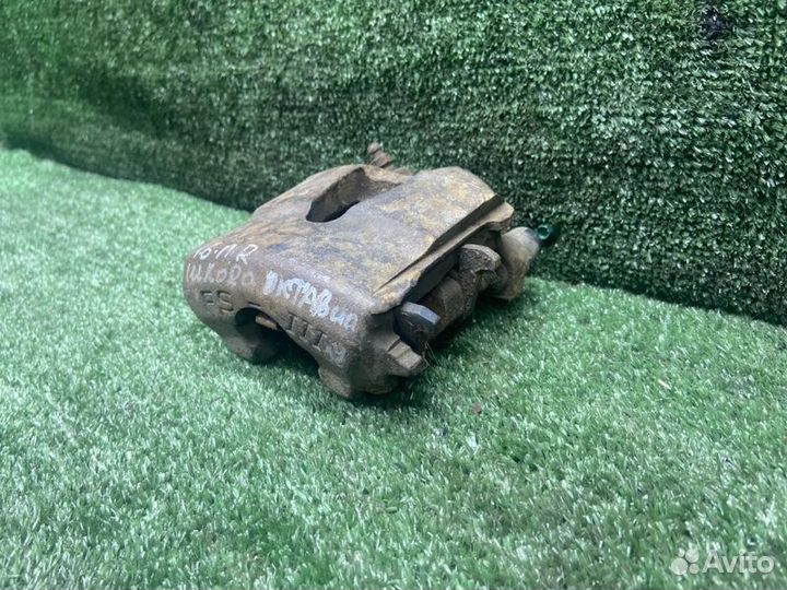 Тормозной суппорт передний правый Skoda Octavia 1