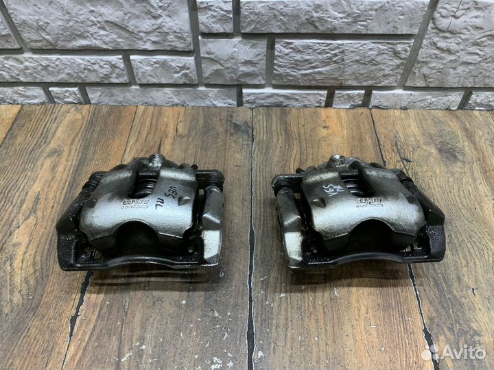 LADA Vesta Суппорт тормозной передний LH RH