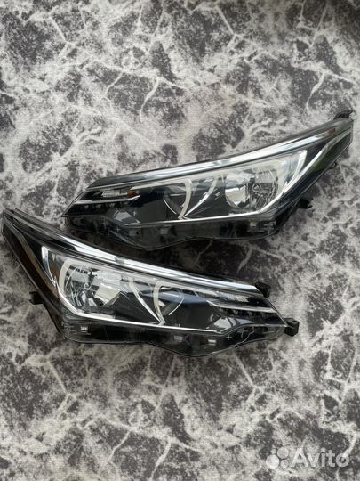 Фары Toyota Corolla E180 restailing оригинал