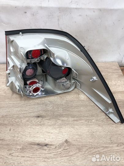 Левый фонарь Opel Astra h седан