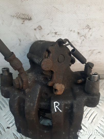 Суппорт тормозной задний правый Opel Vectra