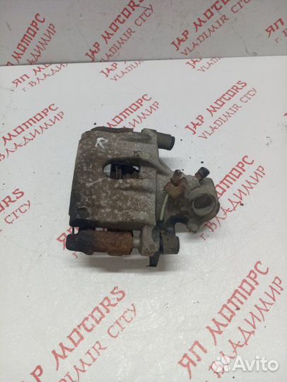 Суппорт тормозной передний правый Mazda 3 Bl