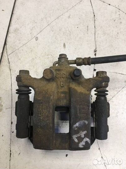 Суппорт тормозной задний правый