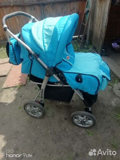 Детская коляска с перекидной ручкой