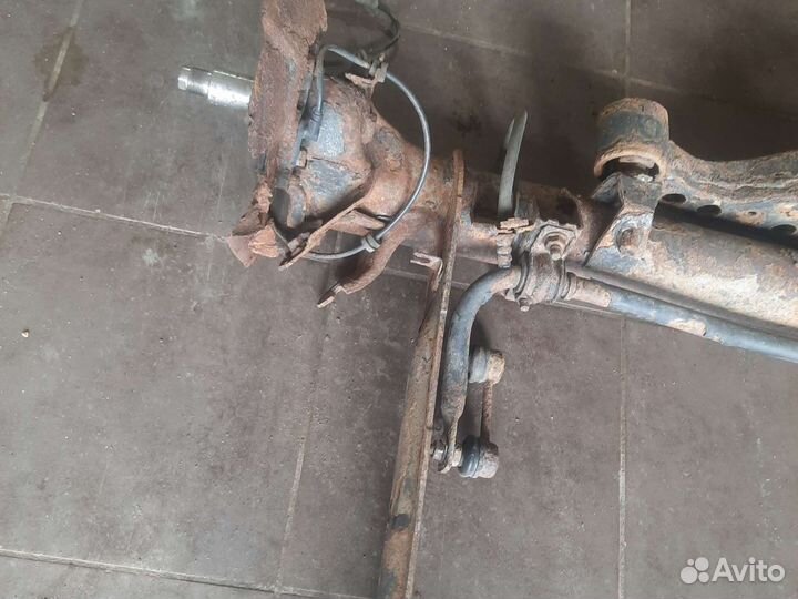 Nissan primera p12 задняя балка