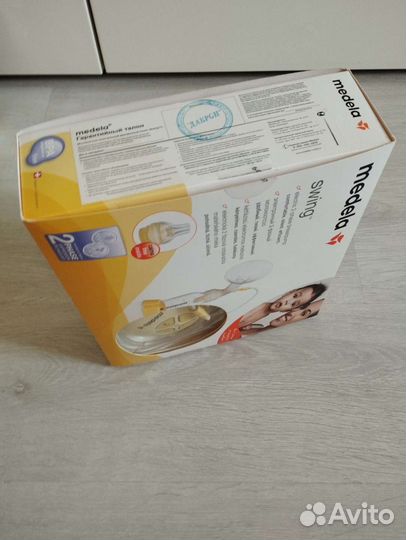 Молокоотсос medela swing электрический