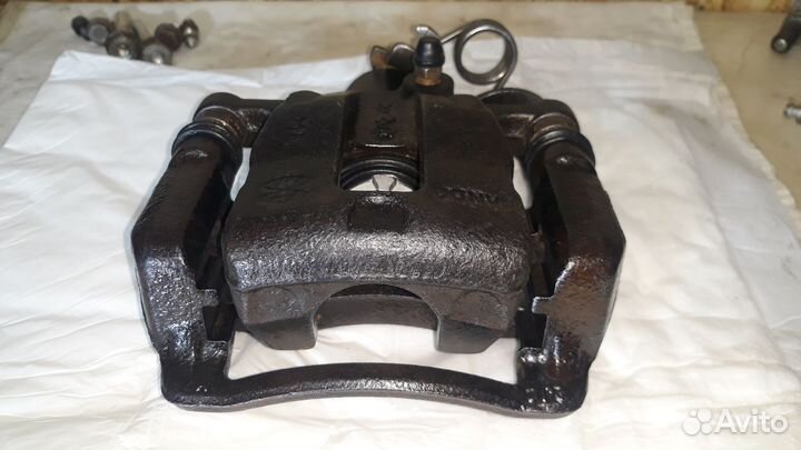 Суппорт задний правый kia rio 3