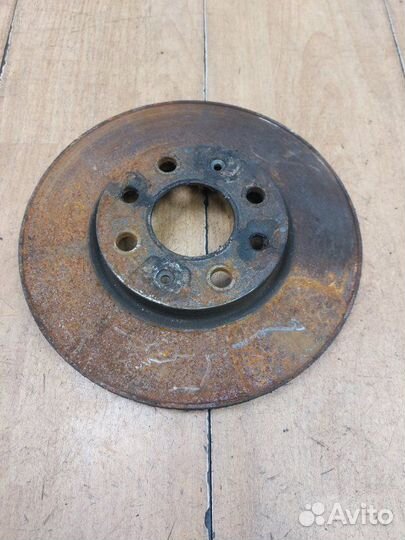 Тормозной диск передний левый Opel Corsa D Z12XEP