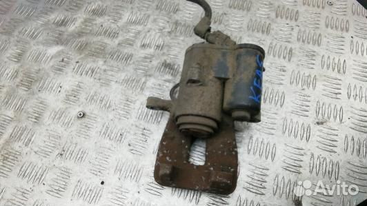 Суппорт тормозной задний правый volkswagen passat