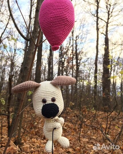 Собака на шарике