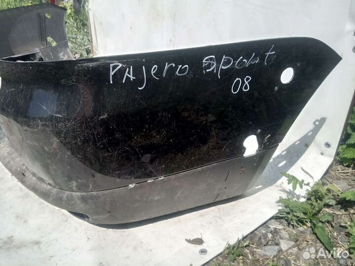 Бампер задний Mitsubishi Pajero Sport 2010