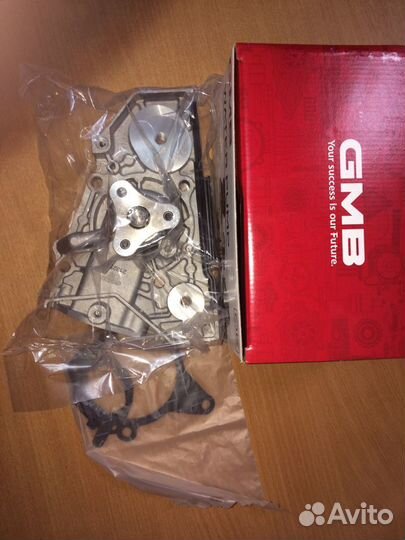 Помпа водяная Киа Спектра / Рио 1