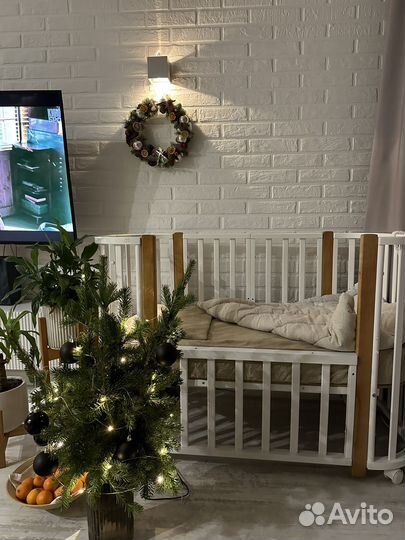 Кроватка для новорожденных с маятником