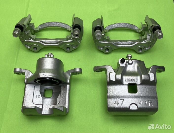 Nissan Tiida LADA Vesta Largus тормозной суппорт