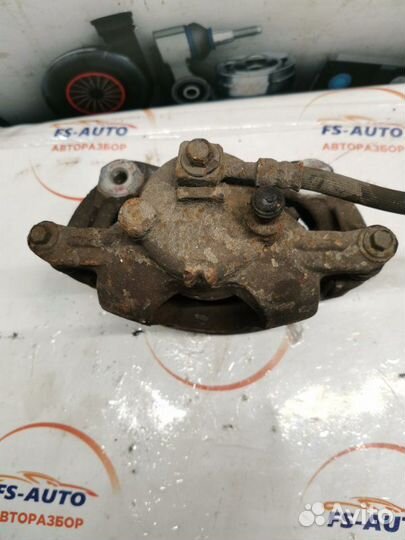 Суппорт тормозной передний левый Opel Astra J