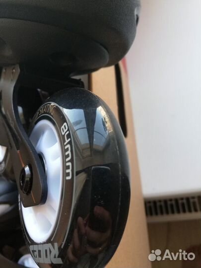 Роликовые коньки