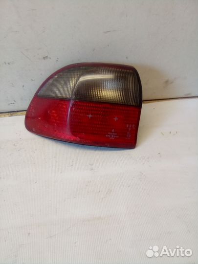 Фонарь наружный левый Opel Omega