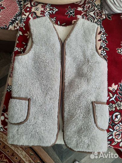 Меховая жилетка