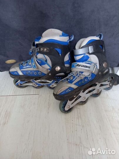 Роликовые коньки