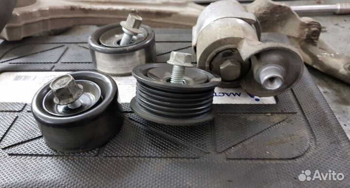 Натяжитель ремня генератора Sportage 3