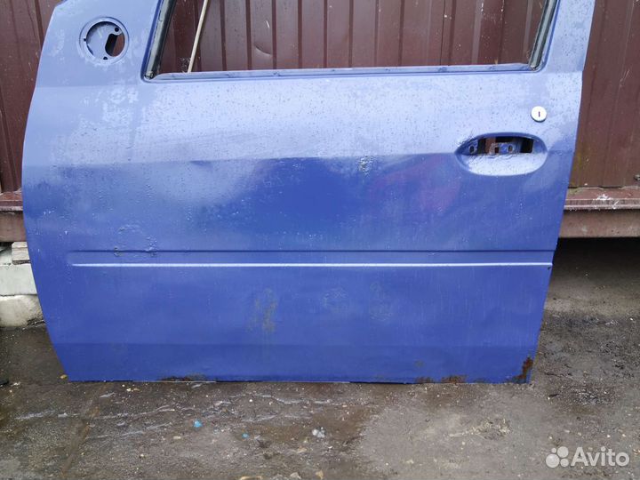 Дверь передний левый Renault Logan 1
