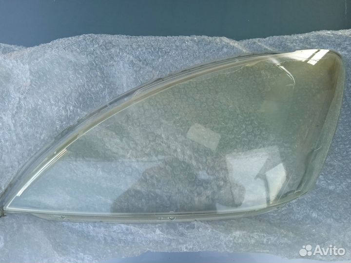 Стекла на фары Лансер 9