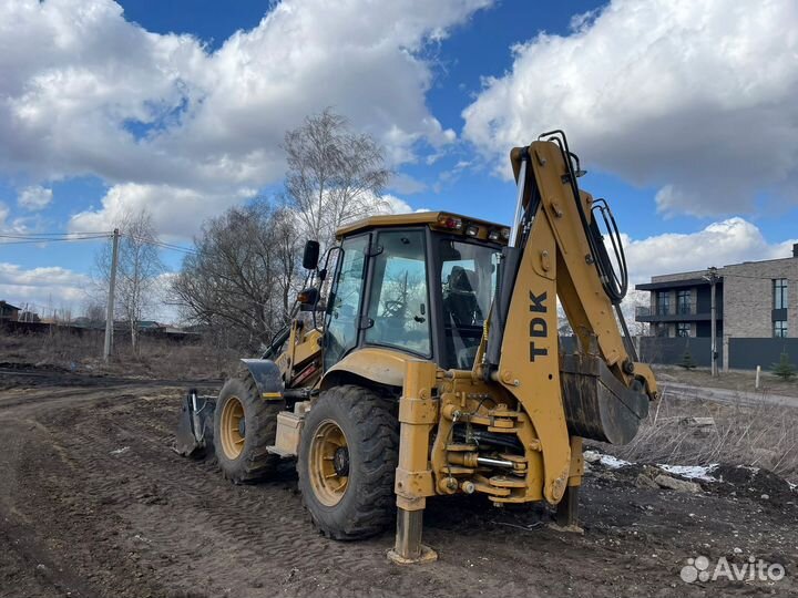 Аренда экскаватора погрузчика услуги трактора