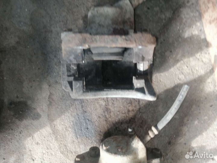 Суппорт тормозной Renault Logan 1