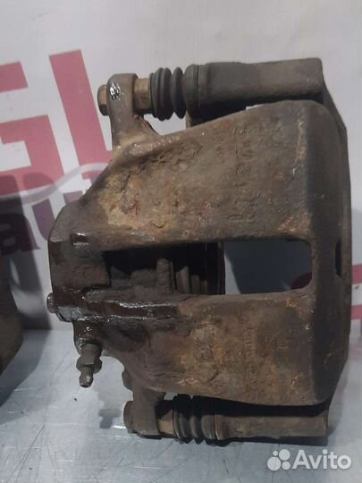 Суппорт тормозной VW Golf 3