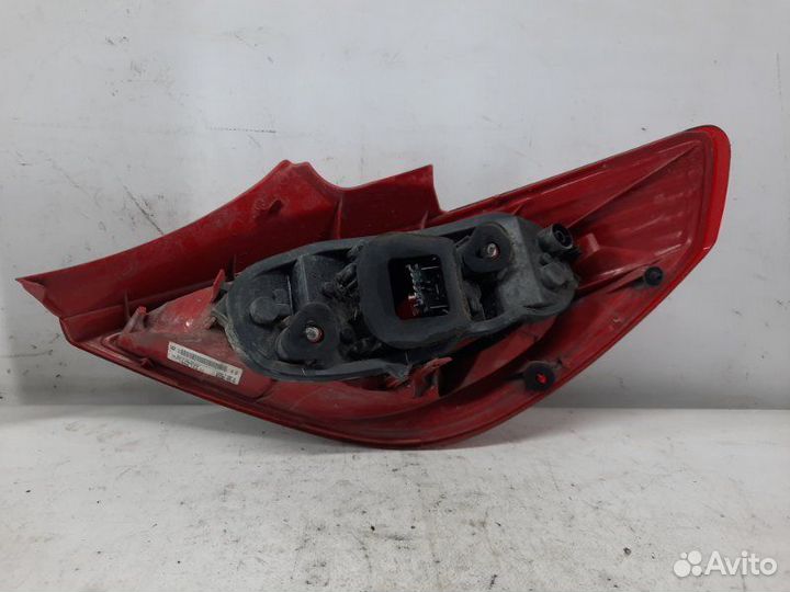 Фонарь задний левый Opel Corsa хэтчбэк 3 дв. 1.2