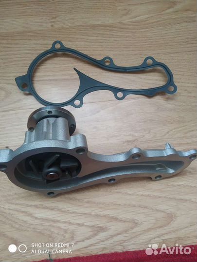 Насос водяной (помпа) для almera n16 QG18. Новая