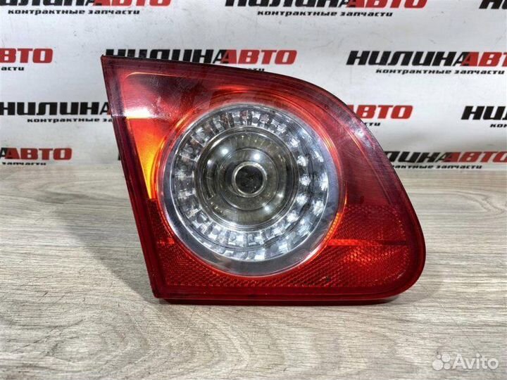 Фонарь левый в крышку багажника Volkswagen Passat