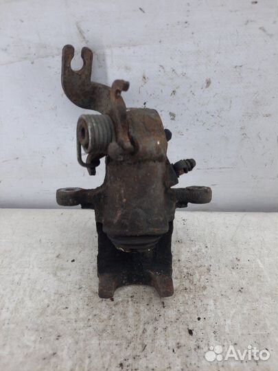 Суппорт тормозной задний правый Kia Cerato хэтчбэк