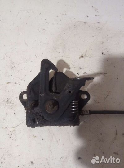 Замок капота mazda protege