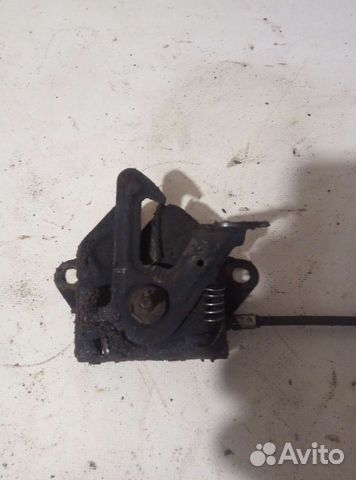 Замок капота mazda protege