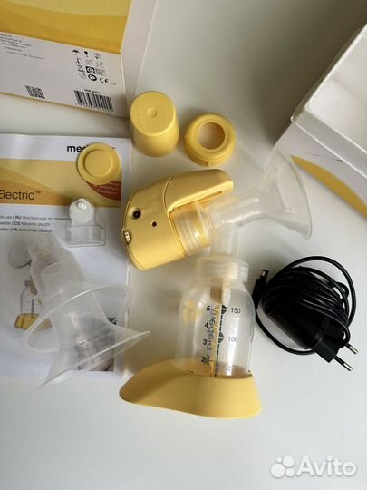 Молокоотсос medela электрический