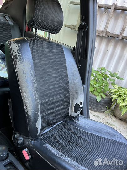 Автомобильные чехлы Рено Логан