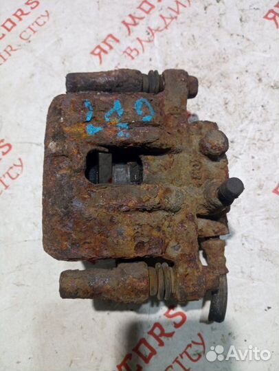 Суппорт тормозной задний Mitsubishi Lancer 10 CY4A