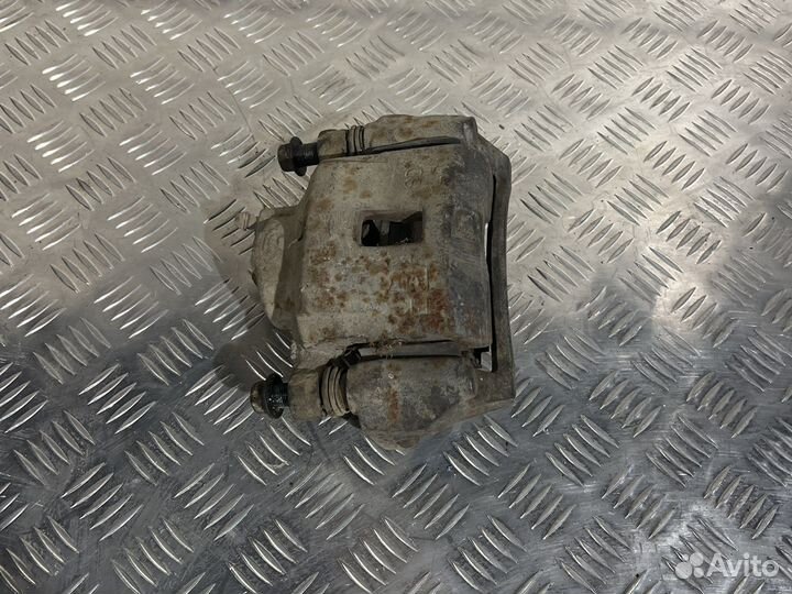 Суппорт передний левый kia spectra