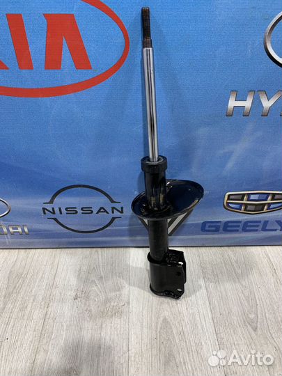 Амортизатор стойка перед Nissan almera G15 Лев, Пр