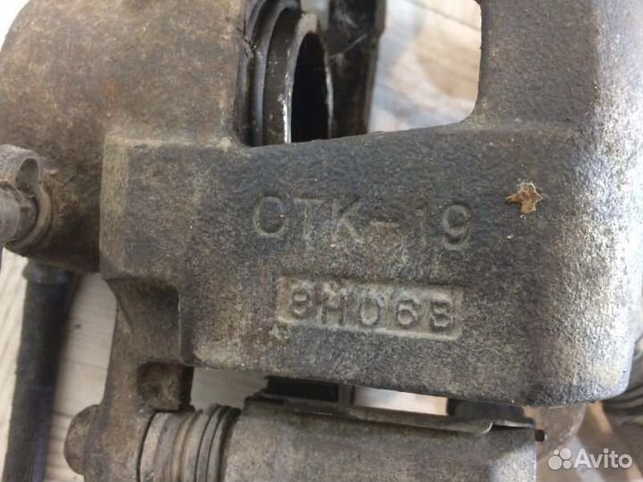 Суппорт тормозной передний левый Chevrolet Lacetti