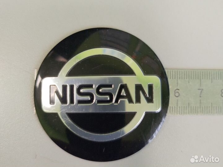 Наклейки на колачки для колёс nissan