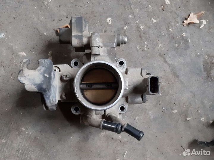 Дроссельная заслонка Kia Cerato 1