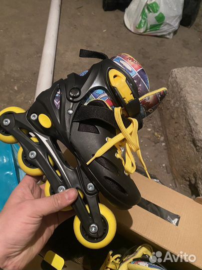 Роликовые коньки