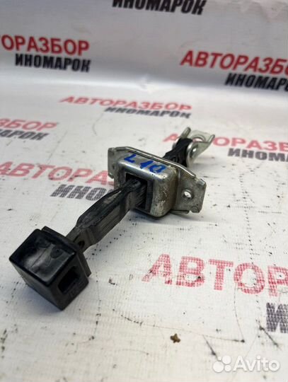 Ограничитель двери задний Mitsubishi Lancer 10 CX