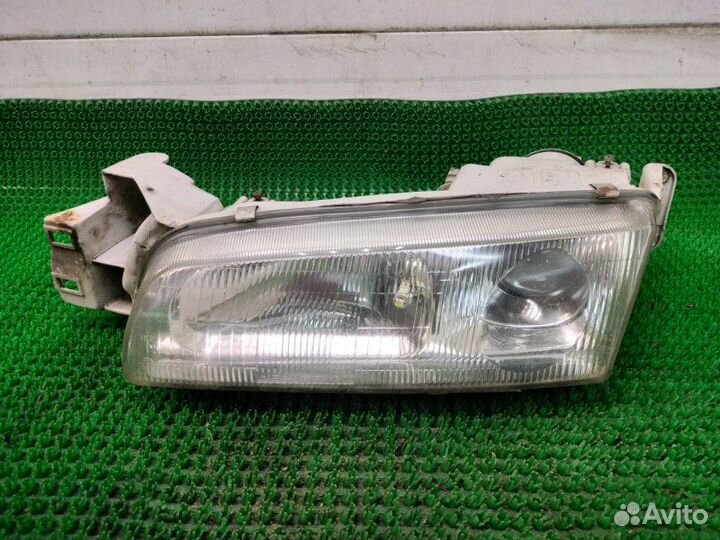 Фара передняя левая Mazda 626 GE FS 1995