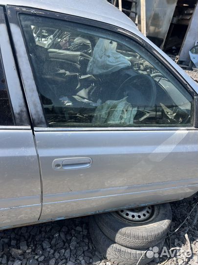 Дверь передняя правая Toyota Carina ST215
